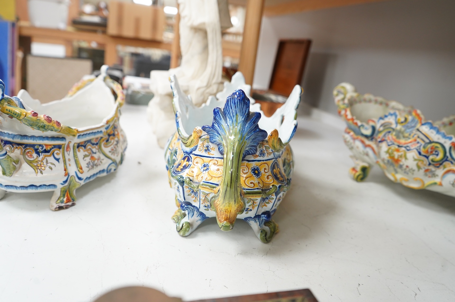 Three French faience planters, one marked Rouen, largest 50cm wide